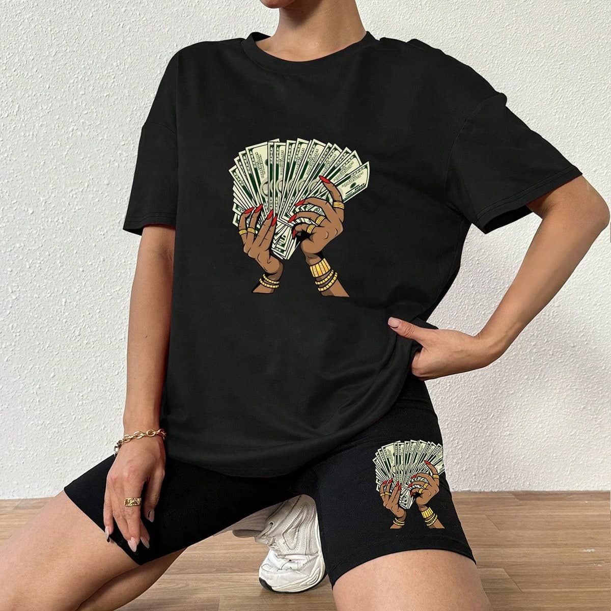 Ensemble de 2 t-shirts pour femmes Ã Ã©paules basses avec impression de dollar dargent